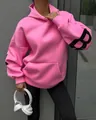 Trendy pink oversized hooded sweatshirt with large black B letter print on the sleeve - Rose Red