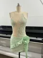 Detail view of mint green sequin dress featuring 3D flower and delicate lace embroidery - XS / Dresses / Light Green