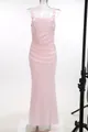 Full display of an elegant pink pleated satin sling long dress on a white mannequin. - XS / Dresses / Champagne Pink