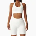 White seamless yoga set with halter-neck bra and high-waist peach lift biker shorts. - S / Top And Bottom / Halter Top And Shorts / White