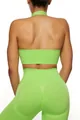 Back view of neon green seamless halter yoga set with high waist peach hip leggings - S / Top And Bottom / Halter Top And Shorts / Green