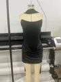 Elegant black strapless bodycon mini dress with draped waist detail on mannequin form - XS / Dresses / Black