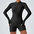 Black long sleeve athletic bodysuit with half-zip and thumbholes for yoga fitness - S / Tops / Black