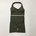 Two-piece seamless yoga set in dark olive green featuring a halter neck sports bra - S / Top And Bottom / Halter Top And Shorts / Army Green