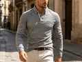 Close-up of men's grey long-sleeve polo shirt with stylish plaid patchwork details. - S / Tops / Light Gray