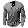 Detail of a men's grey long sleeve Henley shirt with plaid patchwork pocket and placket. - S / Tops / Dark Gray