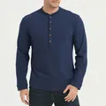 Front view detail of a men's navy blue long-sleeve cotton Henley shirt with buttons - S / Tops / Sapphire Blue