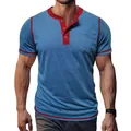 Detailed view of men's blue Henley t-shirt with red contrast trim and chest pocket - Blue