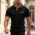 Athletic men's black short sleeve polo shirt with checkered collar and pocket detail - Black