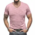 Close-up detail showing the slub cotton texture of this pink men's V-neck T-shirt - Pink