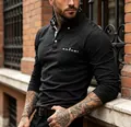 Men's charcoal grey long-sleeve Polo shirt featuring a stylish plaid inner collar and pocket trim - Black