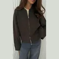 Close-up detail of the dark brown long-sleeve knit cardigan with front zipper closure - S / Tops / Dark Brown