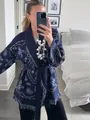 Elegant navy blue paisley knit cardigan with bohemian fringe hem and matching tie belt detail. - S / Tops / Dark Blue