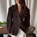 Detailed view of elegant chocolate suede blazer with wide lapel and waisted fit. - S / Top (Two Button Style) / Dark Brown