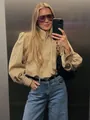 Fashionable khaki short trench coat jacket with puff sleeves and stand collar on a model - S / Tops / Khaki