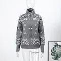 Vintage gray paisley knit cardigan featuring a front zipper and relaxed fit for spring wear - M / Tops / Gray