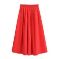 Vue détaillée d'une jupe ligne A rouge à taille haute et ceinture élastique - XS / Bas / Rouge