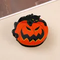 Κλαμερ μαλλιών για το Halloween με μαύρη γάτα πάνω σε σχέδιο πορτοκαλί κολοκύθας - Μαύρη Γάτα Κολοκύθα