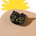 Halloween black cat hair claw clip with glitter finish and yellow feline face design - Kitten