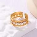 Close-up of gold-plated open ring with white enamel heart patterns - Open Adjustable / White Heart Style (JR853) / Gold and White