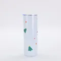 Detailed view of 20oz Christmas tumbler with festive tree and snowflake prints - Style 5 (Light Blue Christmas Tree)