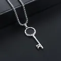 Macro detail view of silver stainless steel key pendant with Roman numeral engraving - Key-2.5 Titanium Steel Chain / 70cm