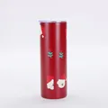 Close-up detail of a red Christmas tumbler with festive Santa pattern and clear lid - Style 1 (Red Polar Bear)