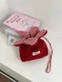 Cute red fuzzy drawstring bag with gingham floral petals and Yes Honey strawberry label - Plush Style / Ancorra Red