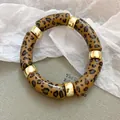 Retro leopard print acrylic tube stretch bracelet with gold spacers for chic stacking. - Tortoiseshell Pattern / Dark Coffee (2#)