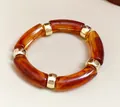 Elegant retro amber acrylic tube bead bracelet with polished gold metal spacers - Two-tone Patchwork Style / Pink-Black