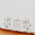Detailed view of ornate silver-plated floral pendants with clear CZ stones for DIY jewelry - Silver Butterfly (26mm*15mm)