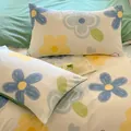 Floral print pillowcases with blue and yellow flower patterns for bedding decor - Pet Paradise
