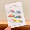 Set of six colorful star-shaped snap hair clips for girls on a white display card - Star Teardrop Style / 6-Piece Set / Macaron Color