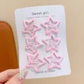 Six-piece set of pink star-shaped metal snap hair clips on a decorative white card display - Star Pattern / 6-Piece Set / Light Pink
