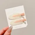 Set of two cream glitter hair clips with peach accents on a white display card. - Marbling Glitter Style (8#) / 2 Pieces/Pack (6.5cm) / Orange Pink