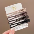 Set of 4 minimalist matte hair clips in earthy tones for girls, cute non-slip hairpins. - Hollow Long Strip Clip / 4-Piece Set (6cm) / Earth Tone Combo