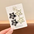 Set of 4 cute star-shaped BB hair clips in black and cream with polka dot patterns. - Five-Point Star Style (6#) / 4-Piece Set (3cm) / Black and White