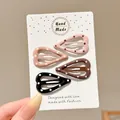 Adorable set of four heart-shaped polka dot hair clips in assorted pastel and dark colors - Heart Polka Dot Style / 4-Piece Pack (Approx 5cm)