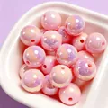 Close-up of pink iridescent acrylic beads with UV coating for DIY jewelry making - 1 Piece/Pack / Pink