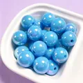 Close-up detail of 16mm light blue iridescent acrylic beads for DIY handmade jewelry - 1 Piece / Blue