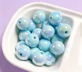 Macro view of light blue iridescent UV plated acrylic beads for DIY jewelry making - 1 Piece / Light Blue