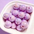 Close-up view of 16mm purple iridescent UV-plated acrylic beads for DIY handmade jewelry - 1 Piece / Light Purple