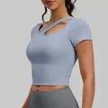 Light blue asymmetrical cutout sports yoga short sleeve top with built-in padded bra - S / Tops / Grey Lake Blue