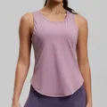 Dusty pink sleeveless yoga tank top with curved hem and breathable athletic fabric - S / Tops / Purple