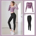Two-piece yoga suit set featuring berry purple long sleeve top and black slimming leggings - Berry Purple + Stellar Black
