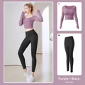 Two-piece yoga suit set featuring berry purple long sleeve top and black slimming leggings - Berry Purple + Stellar Black