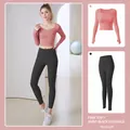 Two-piece yoga set in grapefruit pink and starry black with long sleeve top and leggings - Pomelo Pink + Starry Black