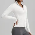 Women's white zip-up long sleeve yoga jacket featuring thumb holes and breathable fabric - S / Tops / White