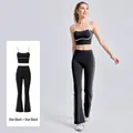 Completo yoga nero da donna con bordini bianchi, canotta elastica e leggings a zampa - Taglia S / Top e Pantaloni / Nero Stellato + Nero Stellato