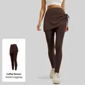 High-waisted brown yoga leggings with ruffled skirt and side drawstring detail design. - S / Bottoms / Distilled Coffee